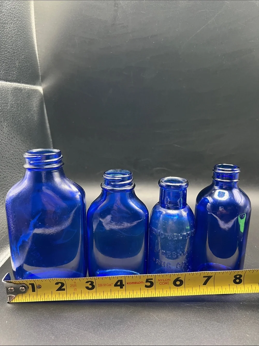 Lot of 4 vintage Colbalt Blue Glass Bottles